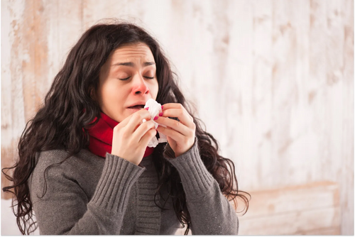 A young woman who catch a cold 